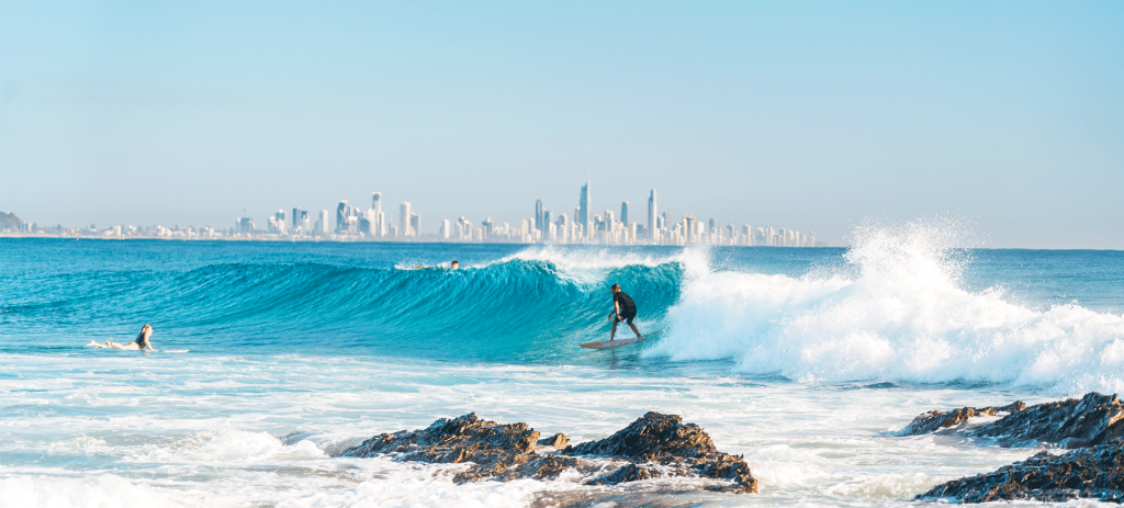 Currumbin Rock Surfer | Credit - Tourism and Events Queensland